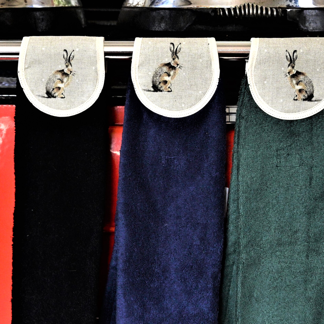 black, navy and green hang ups in hares design