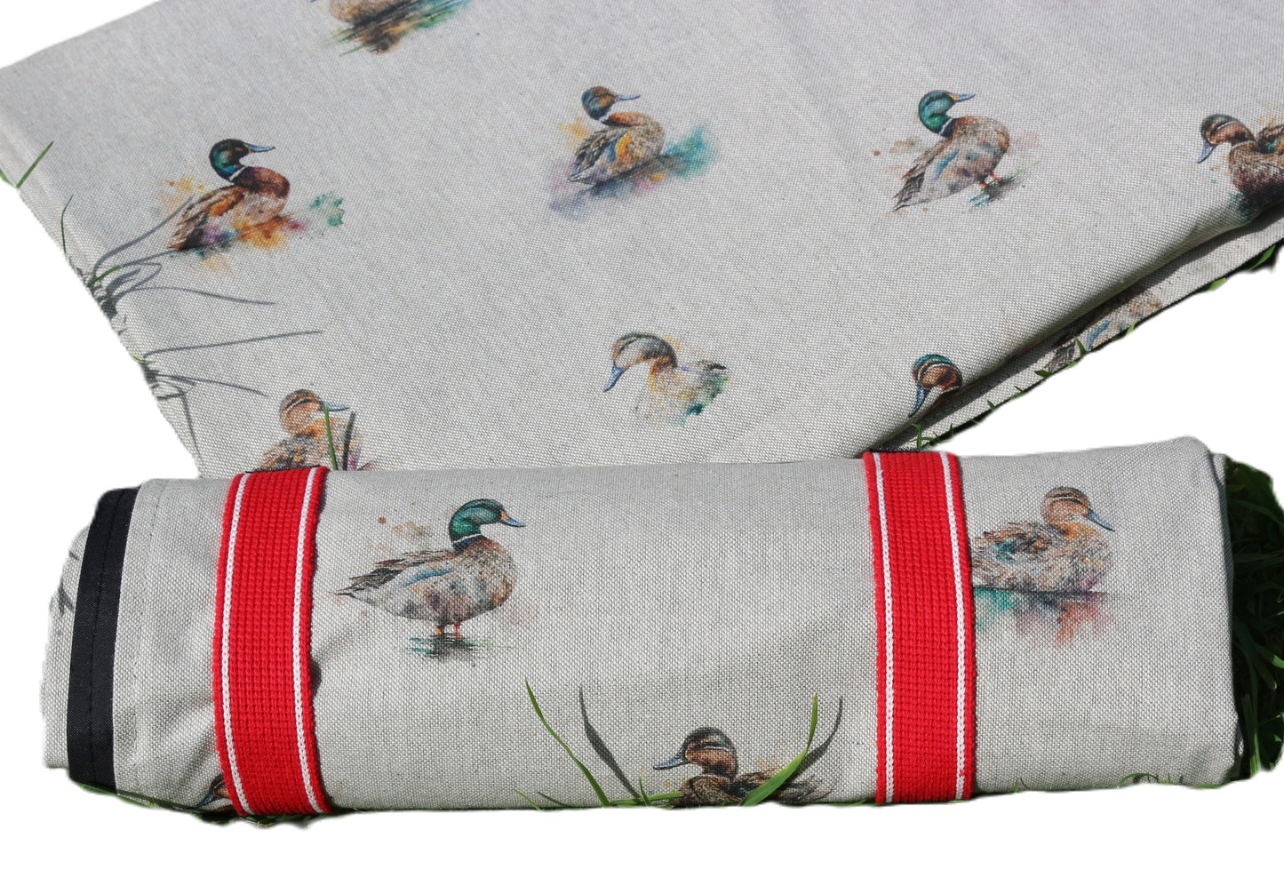 duck design picnic rug rolled up with strap