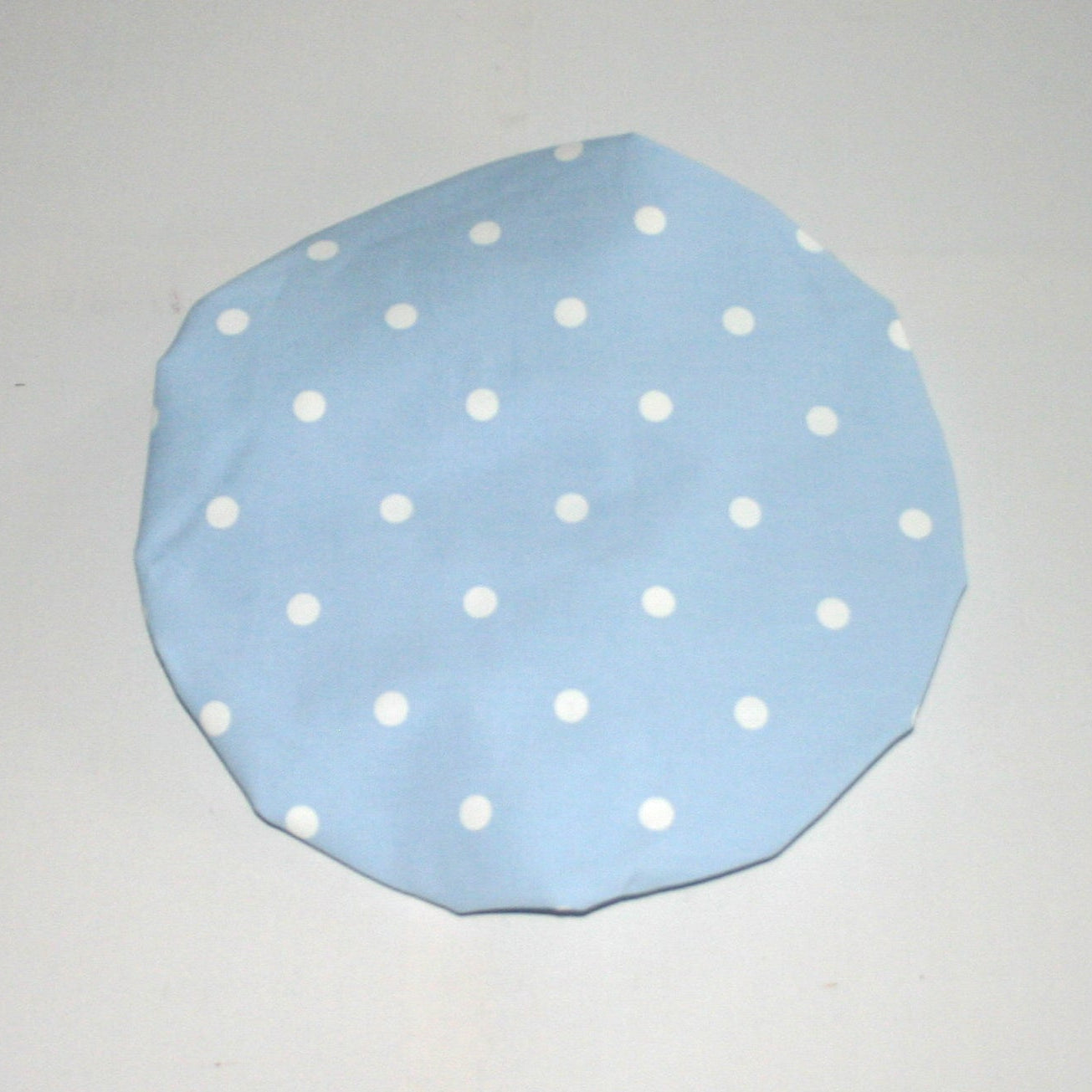 shower hat in blue spots
