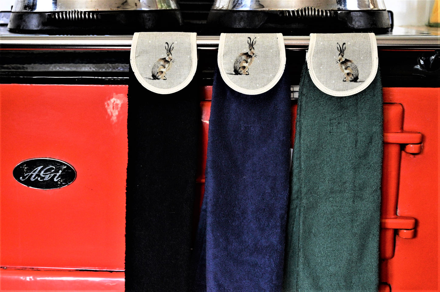 black navy and green hang ups in hare design on red aga