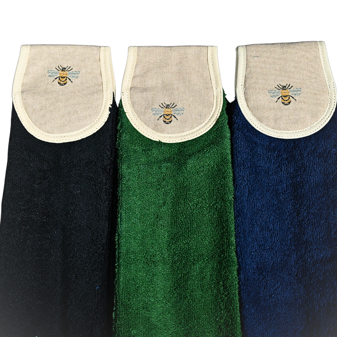 black, green and navy bees hang up towels