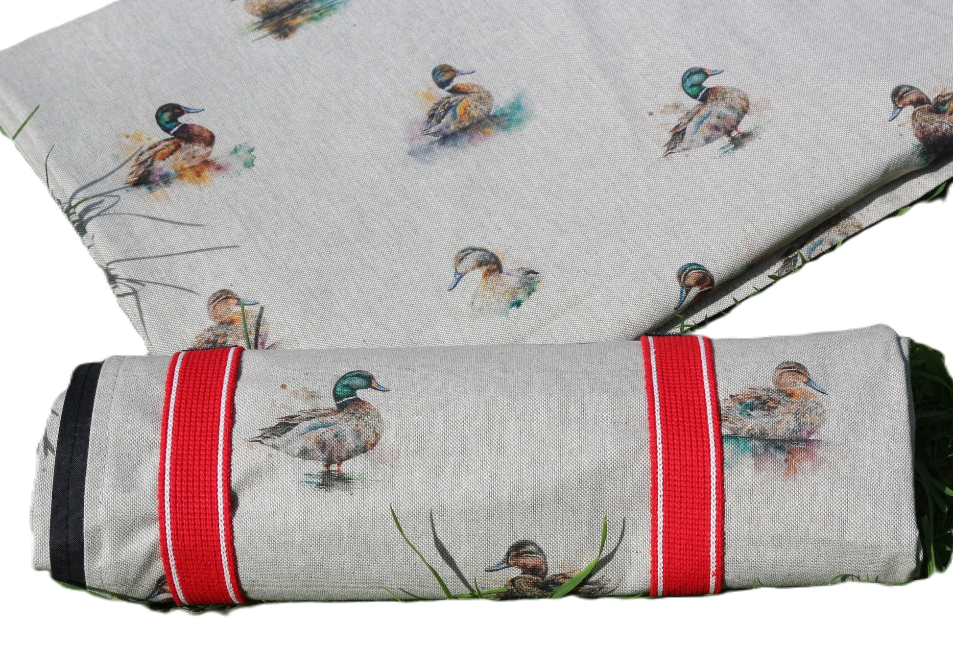 duck design picnic rug rolled up with strap