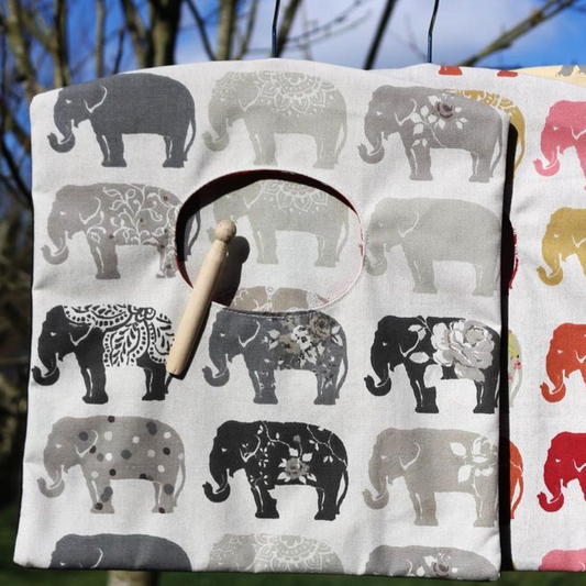 grey elephant peg bag hung on line outside
