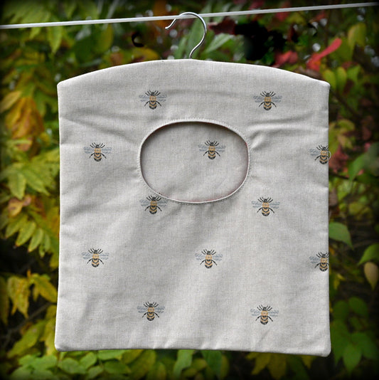 bees peg bag hanging on washing line