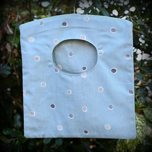 blue spotty peg bag hung outside