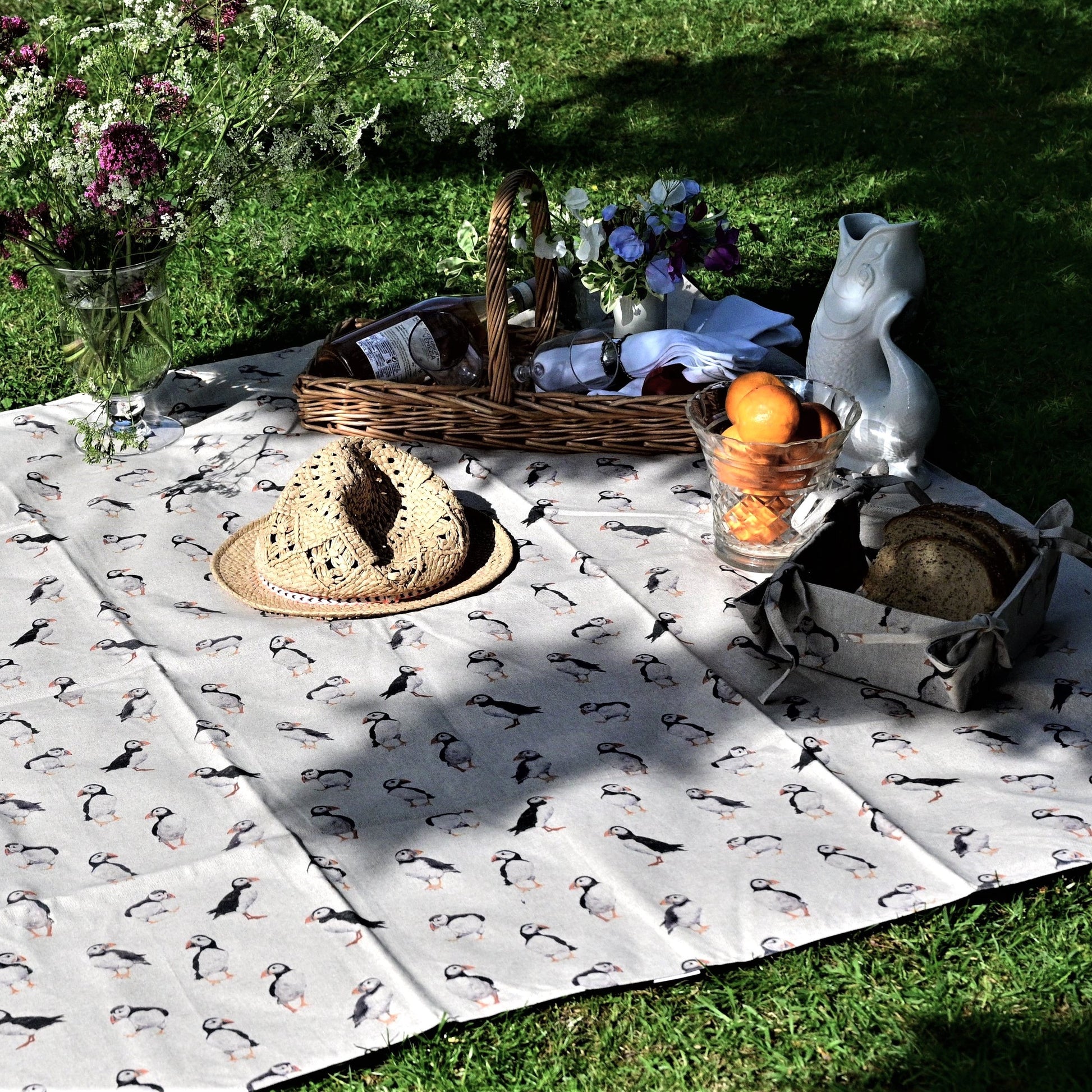 puffins picnic rug lifestyle in park