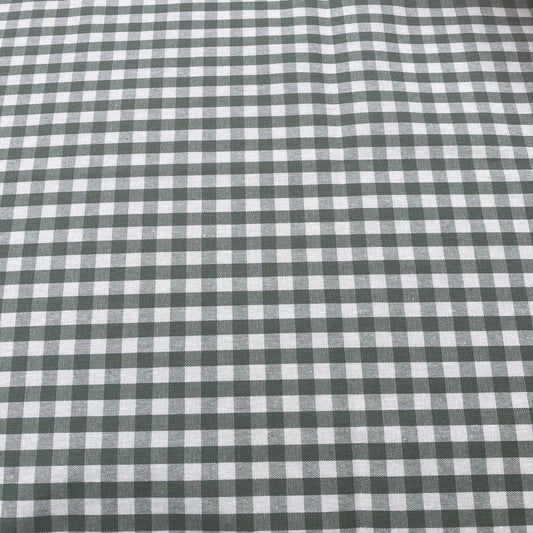 Close-up of green and white checkered gingham tablecloth