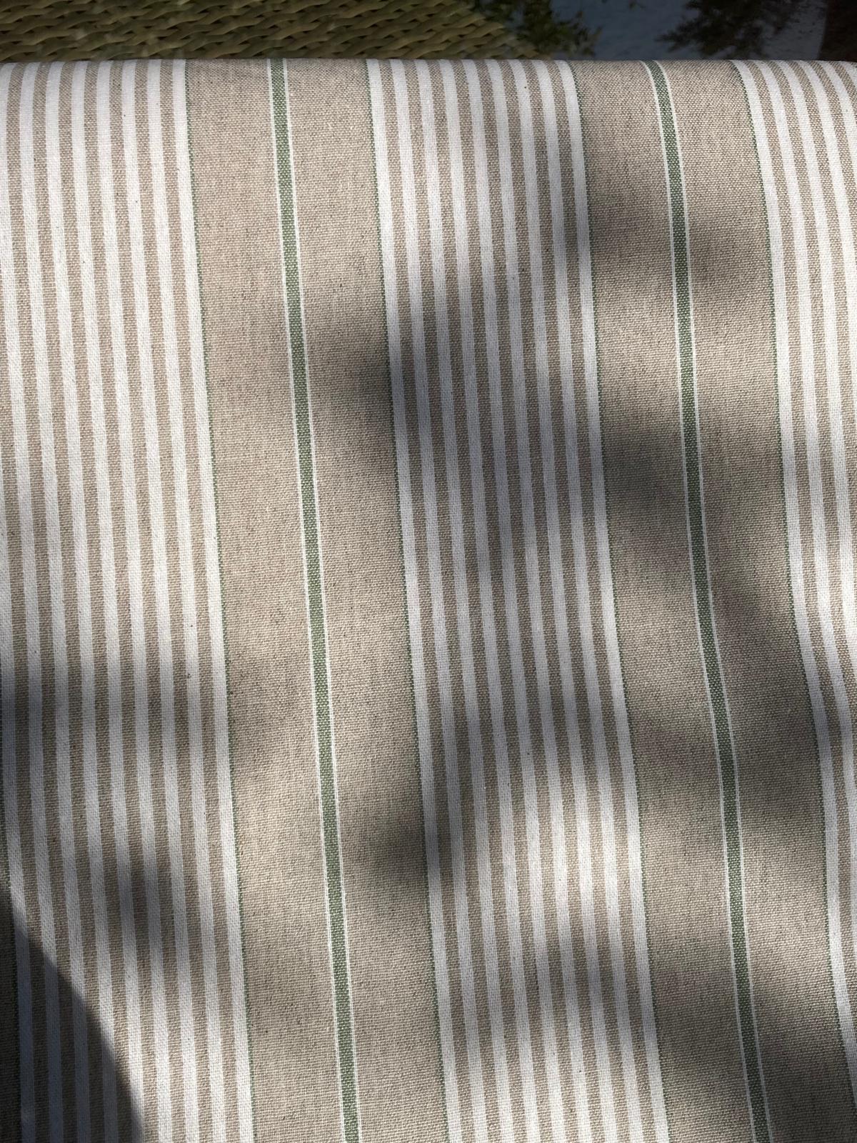 french green stripe print close up of table cloth