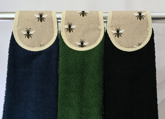 navy, green and black old bees design hang ups on rail