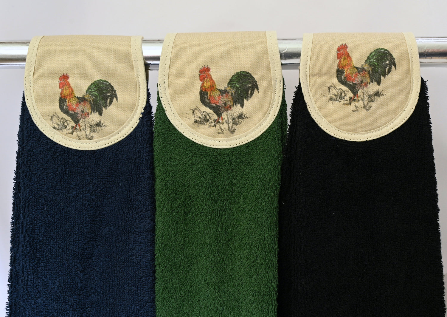 cockerel hang up navy, green and black on rail