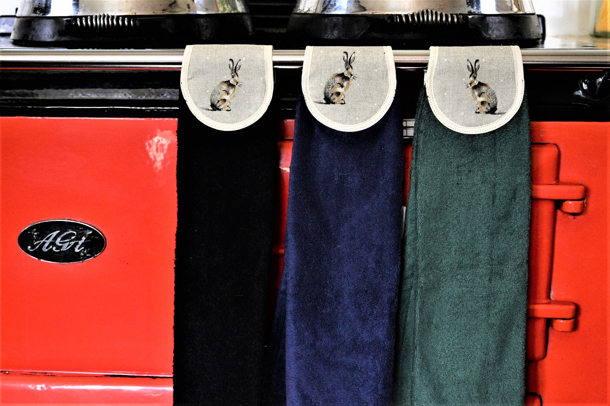 black navy and green hang ups in hare design on red aga