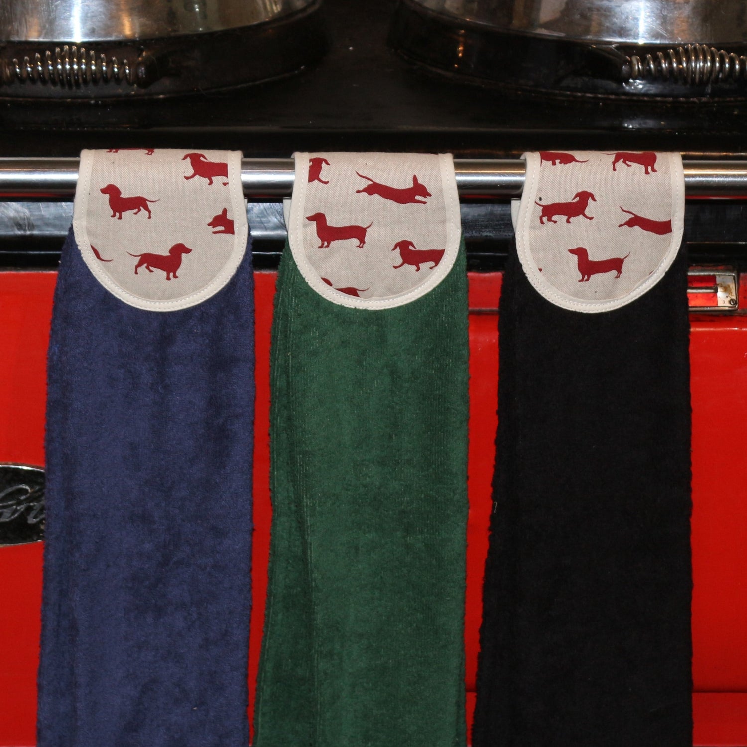 navy, green and black hang ups in red dachshund design on red aga