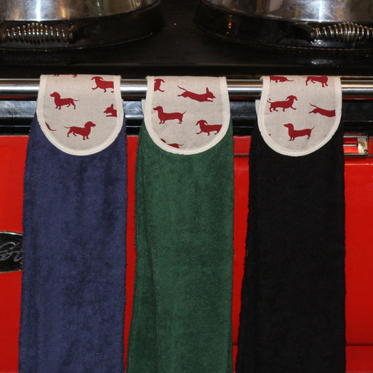 navy, green and black hang ups in red dachshund design on red aga