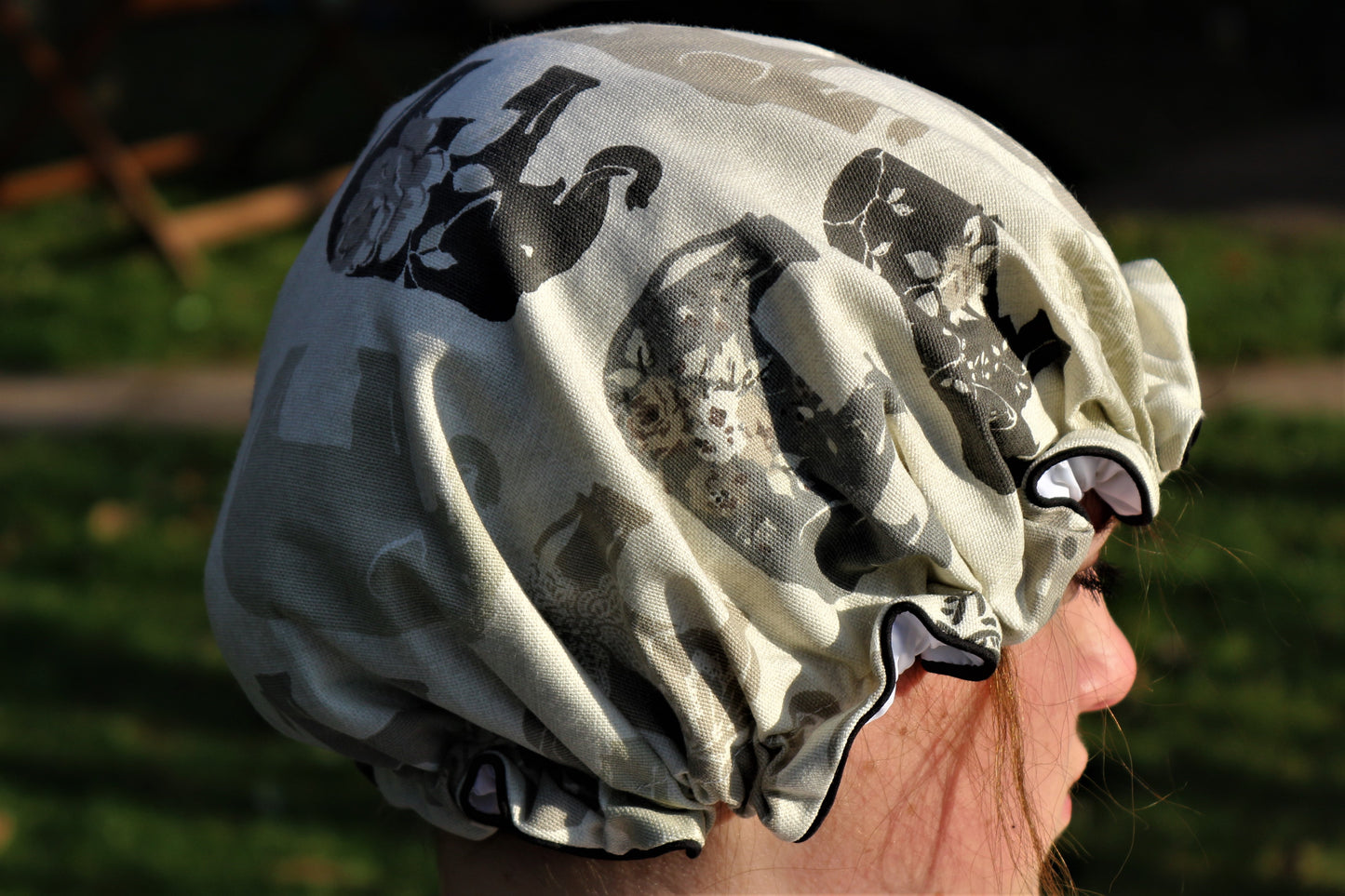 shower hat on head lifestyle outside in nature