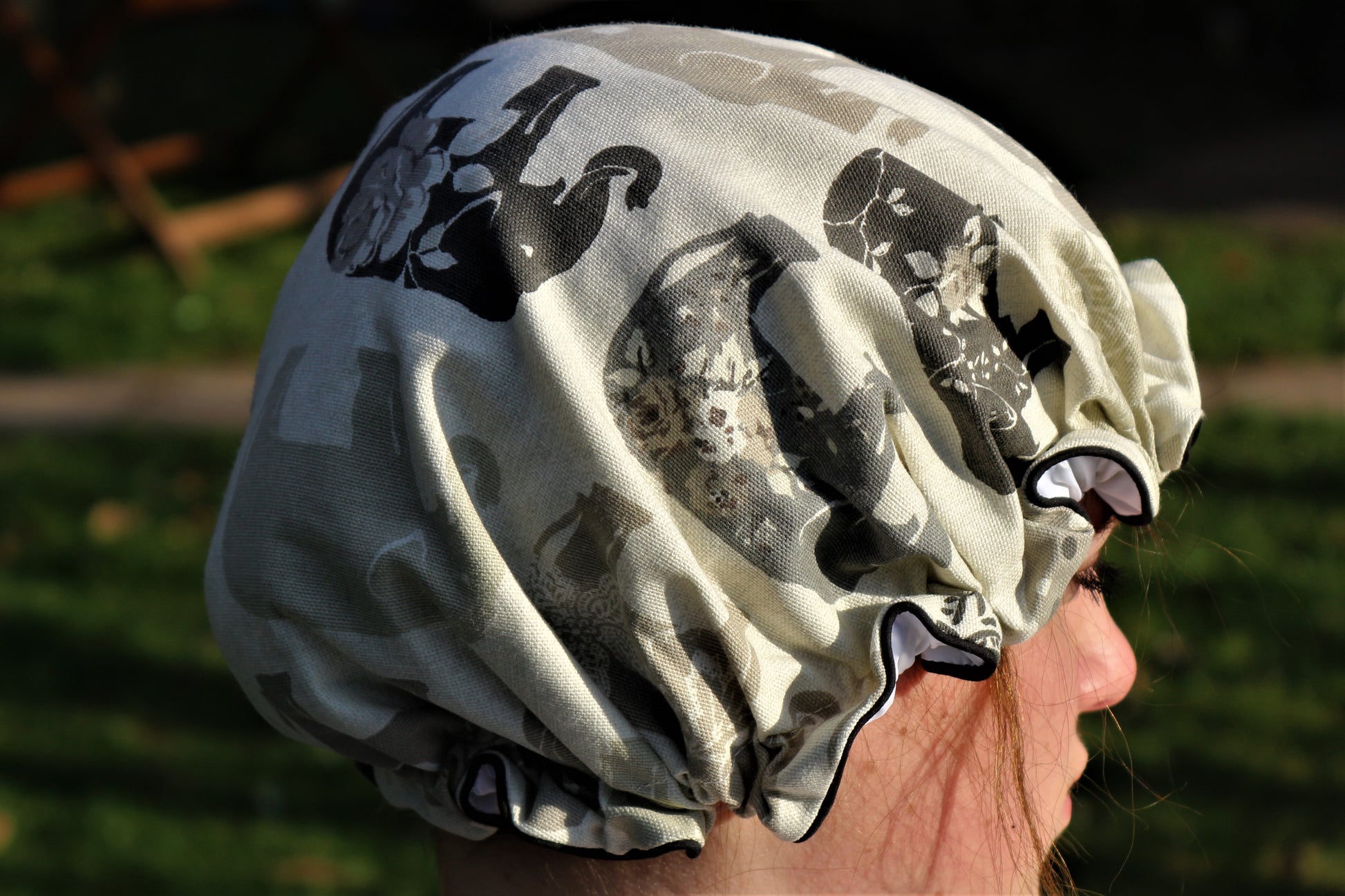 shower hat on head lifestyle outside in nature