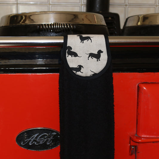 black dachshund hang up towel in black on red aga