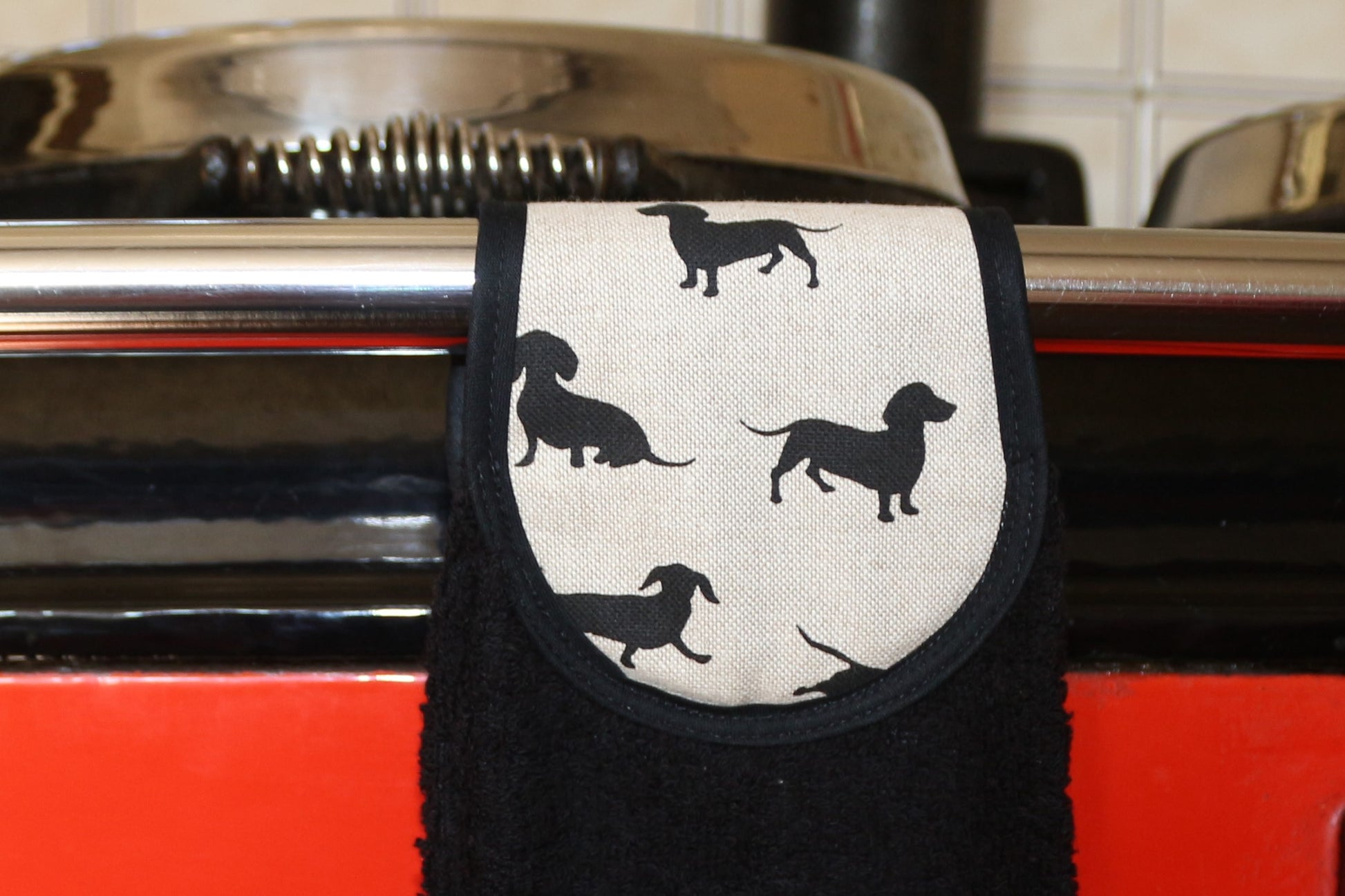 closer details of black dachshund hang up towel