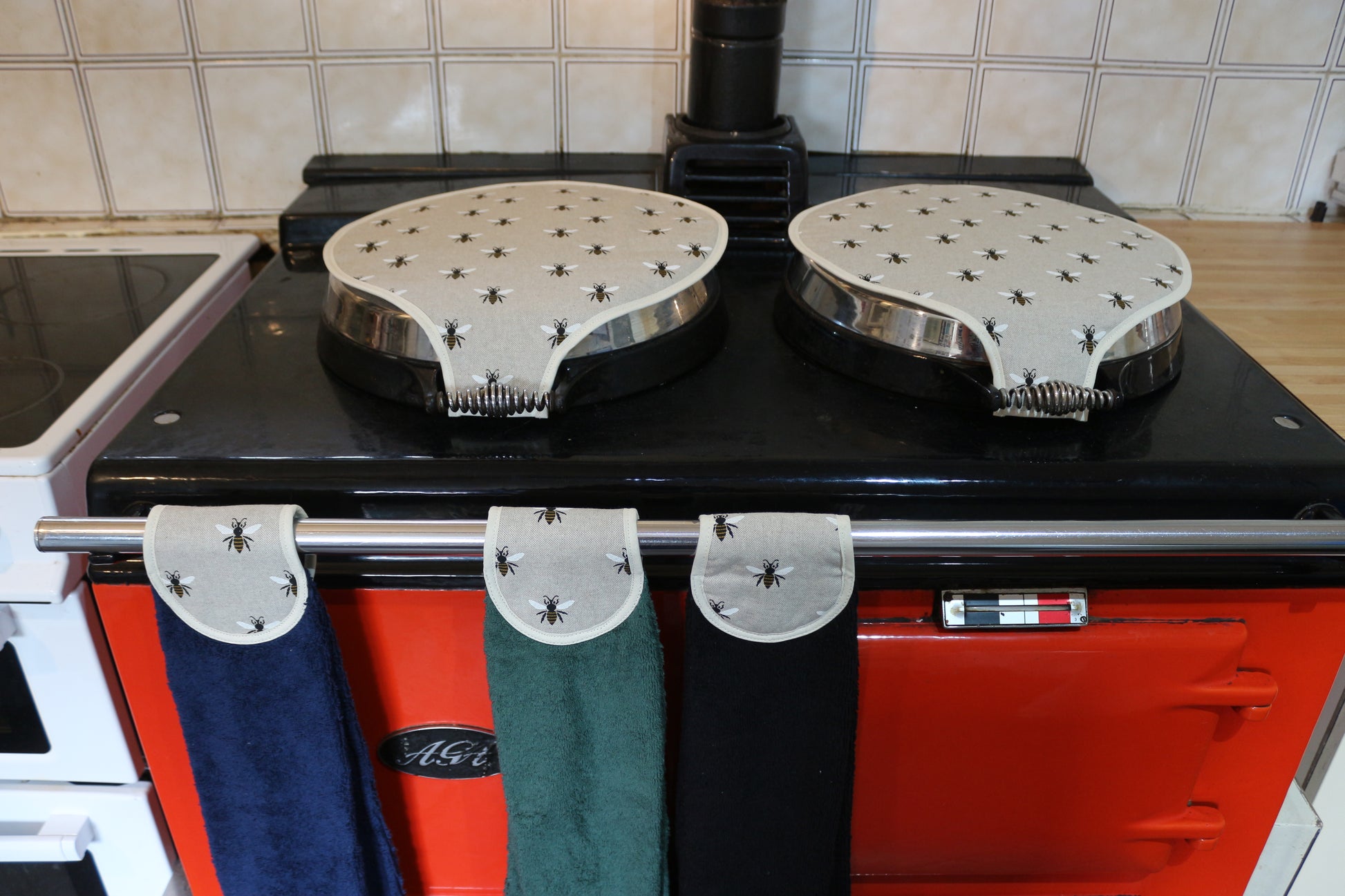 navy, green and black old bees design hang ups in lifestyle picture