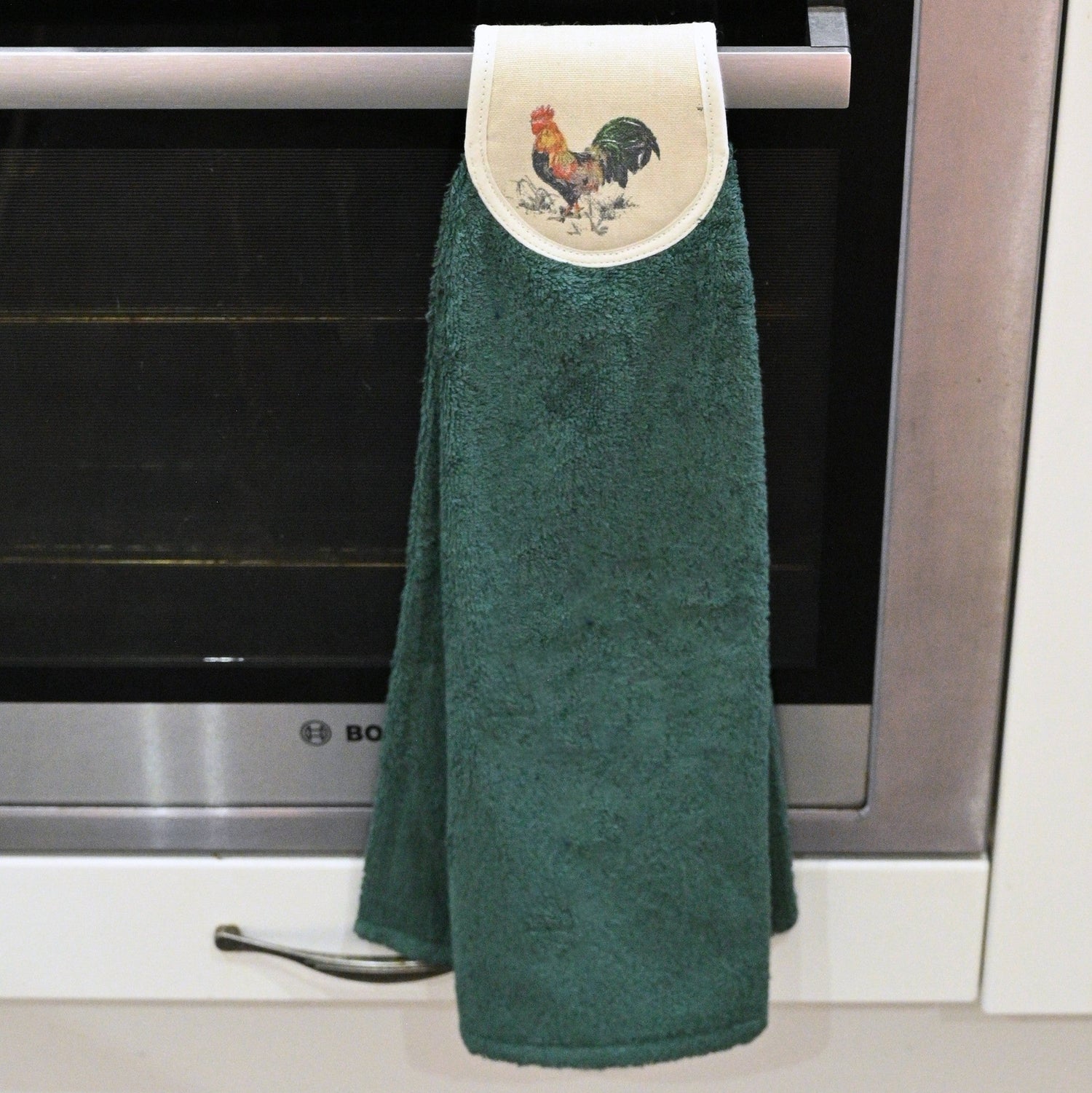 green cockerel hang ups on cooker rail