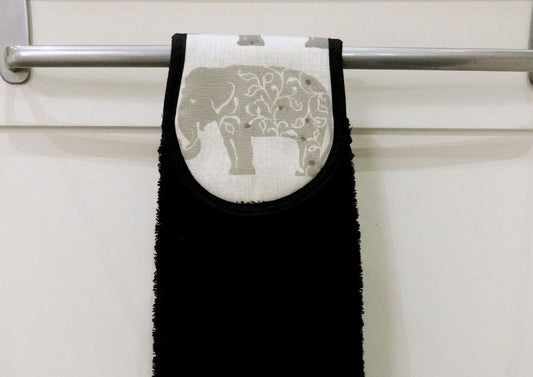 close up of grey elephants hang up towel