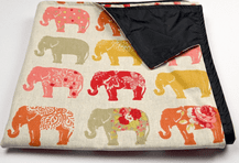 spice elephant picnic rug folded up 