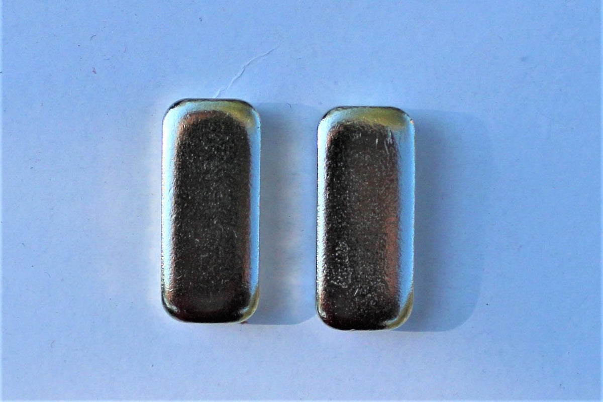 magnet pair on blue background