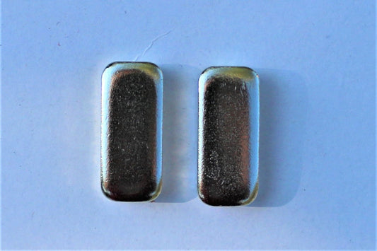 magnet pair on blue background